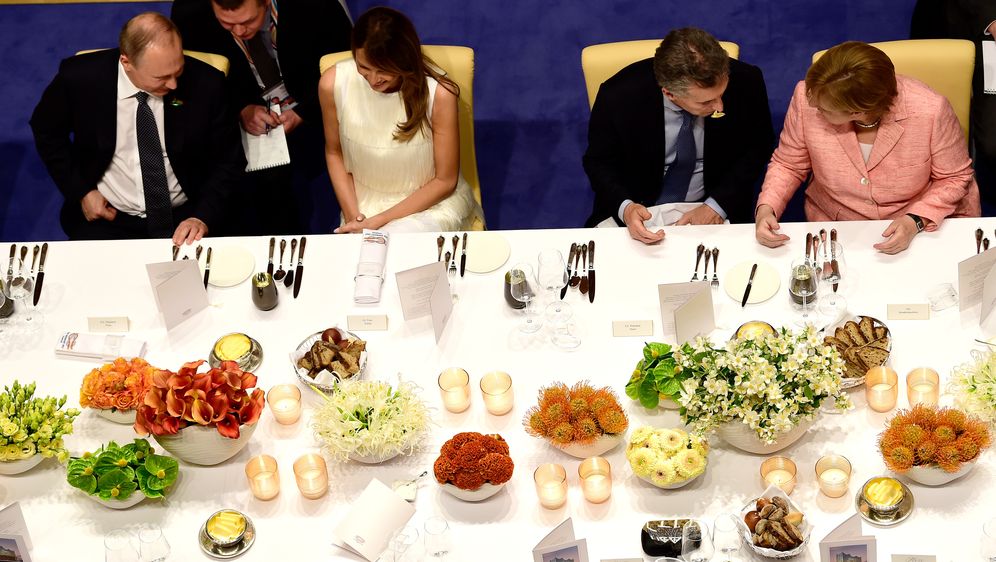 Ruski predsjednik Vladimir Putin i prva dama SAD-a Melania Trump na banketu nakon sastanka G20 u Hamburgu (Foto: AFP) (Foto: )