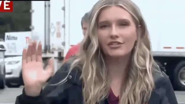 Novinarka Alexis Martin i muškarac s cigaretom u prijenosu uživo