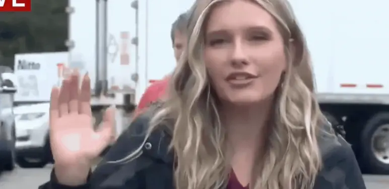 Novinarka Alexis Martin i muškarac s cigaretom u prijenosu uživo