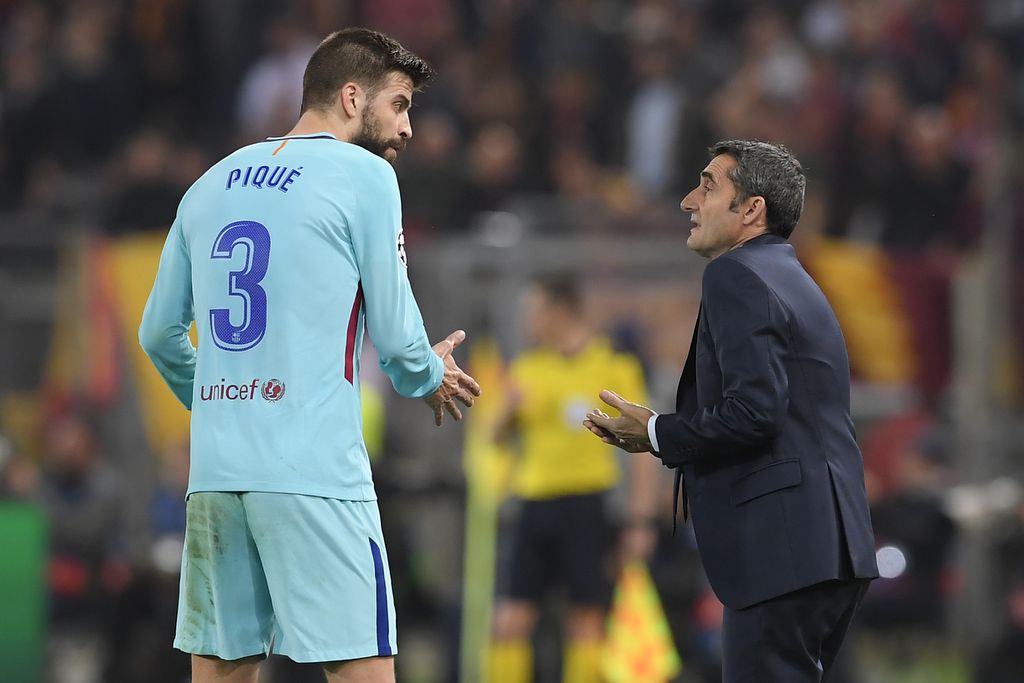 Pique i Valverde (Foto: AFP)