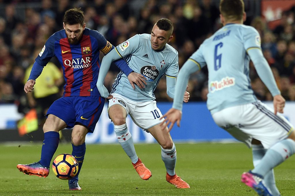 Iago Aspas i Messi u borbi za loptu (Foto: AFP)