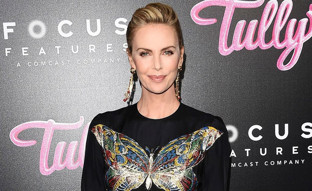 Charlize Theron u plisiranoj haljini modne kuće Dior - 4
