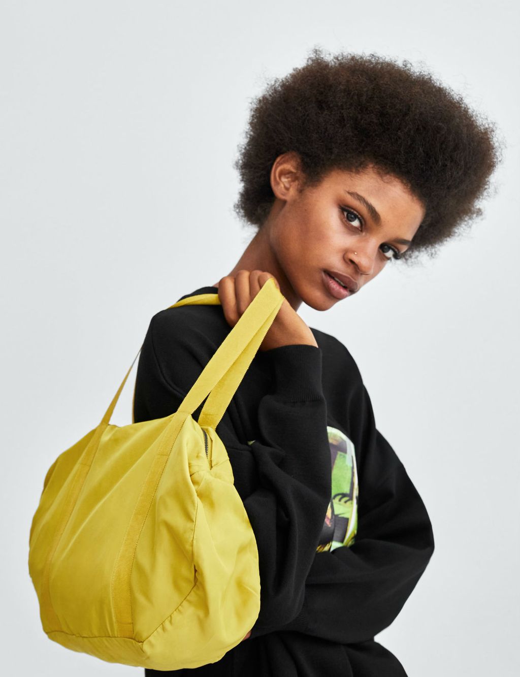 Jakna iz Zare u 2 boje koja se pretvara u torbicu