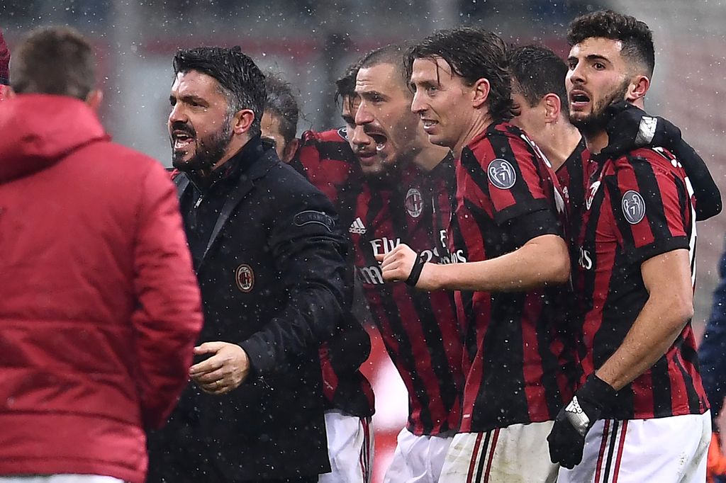 Gennaro Gattuso i igrači Milana (Foto: AFP)