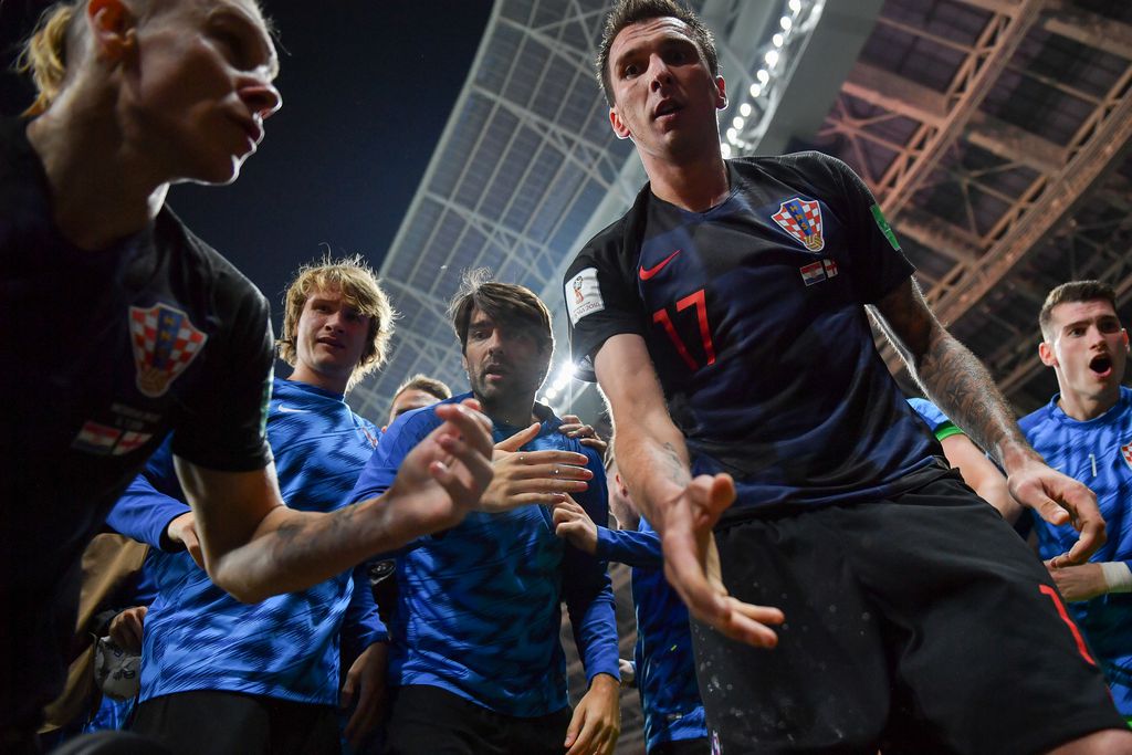 Fotograf iz Salvadora u slavlju hrvatskih nogometaša (Foto: AFP)