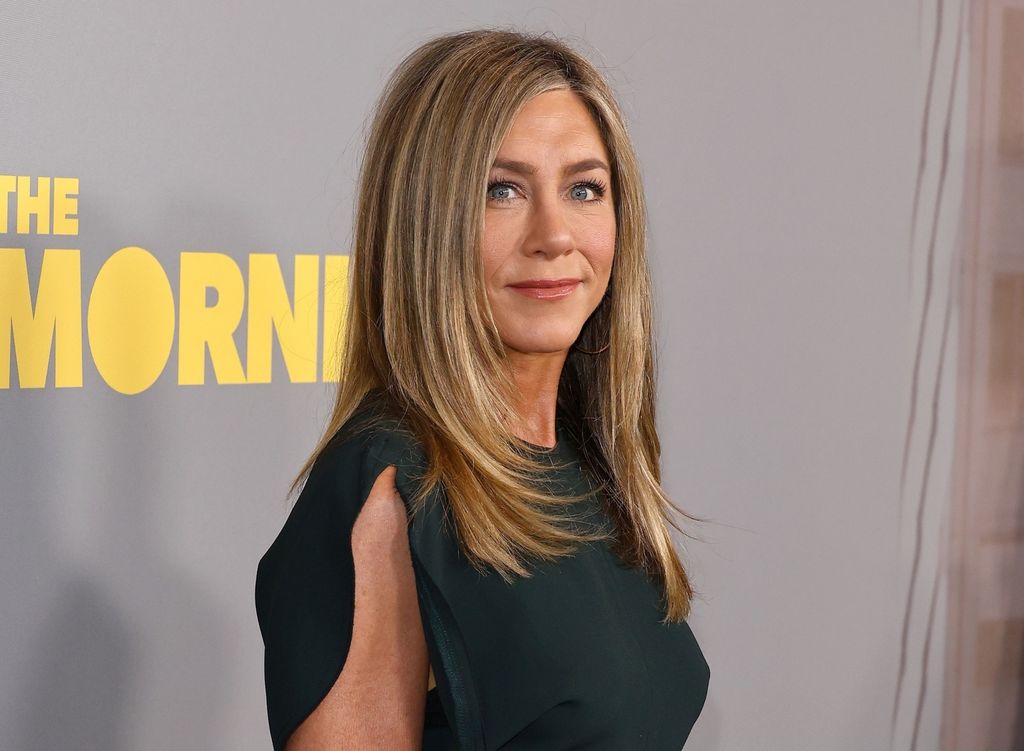 Jennifer Aniston u tamnozelenoj haljini