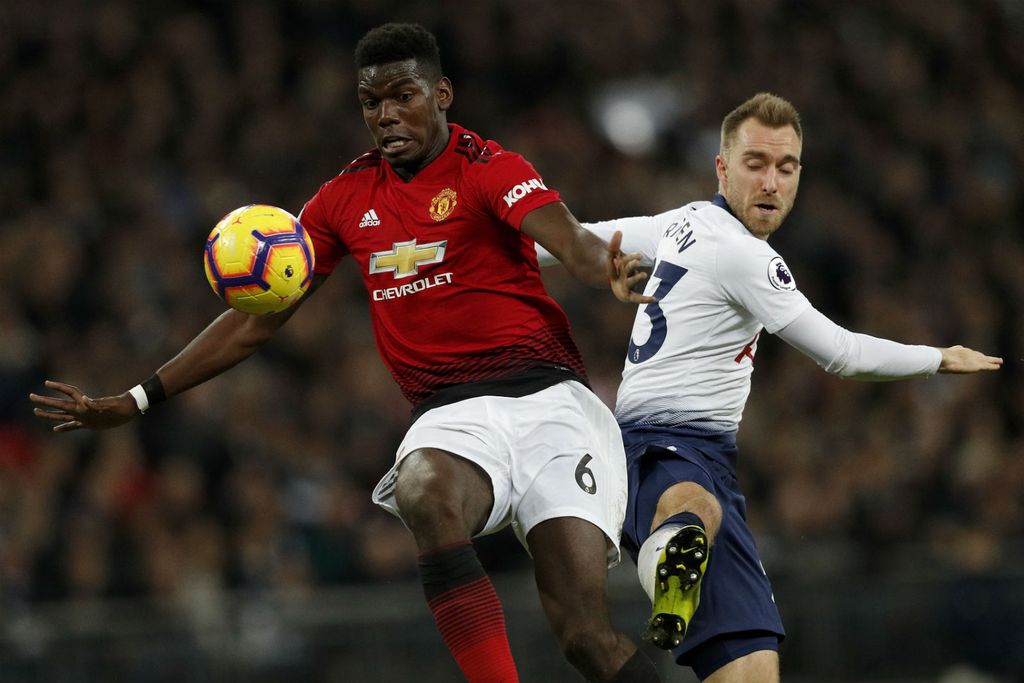 Mete Reala Paul Pogba i Christian Eriksen (Foto: AFP)