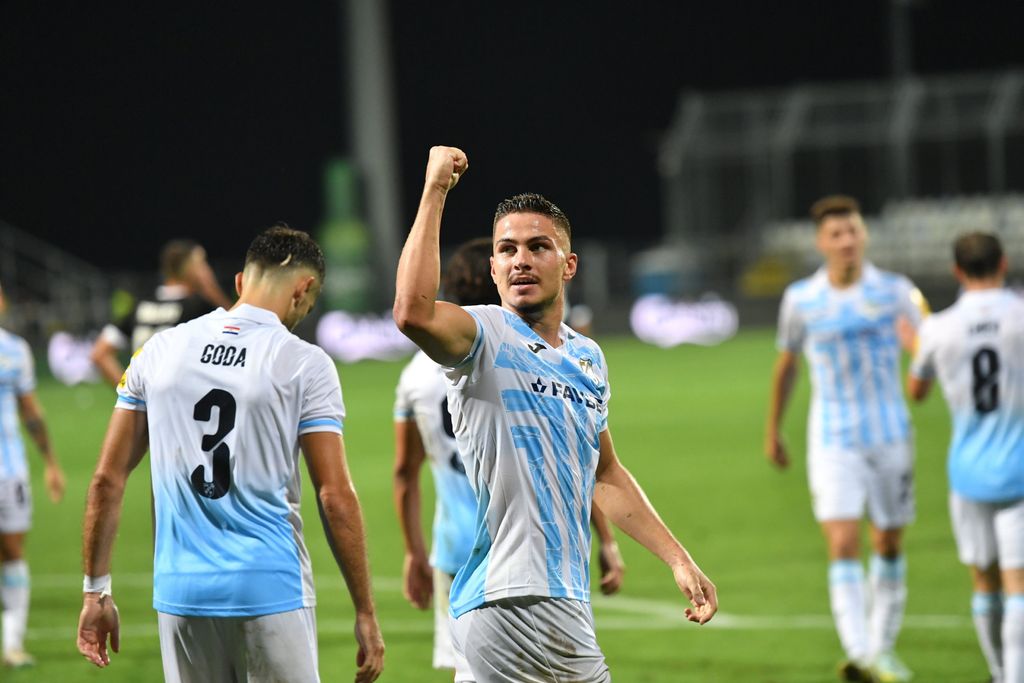 Franjo Ivanović i igrači Rijeke