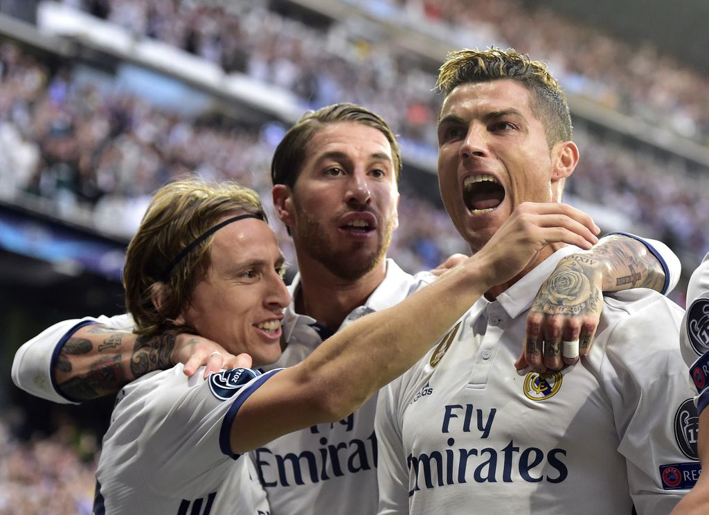 Luka Modrić, Sergio Ramos i Cristiano Ronaldo (Foto: AFP)