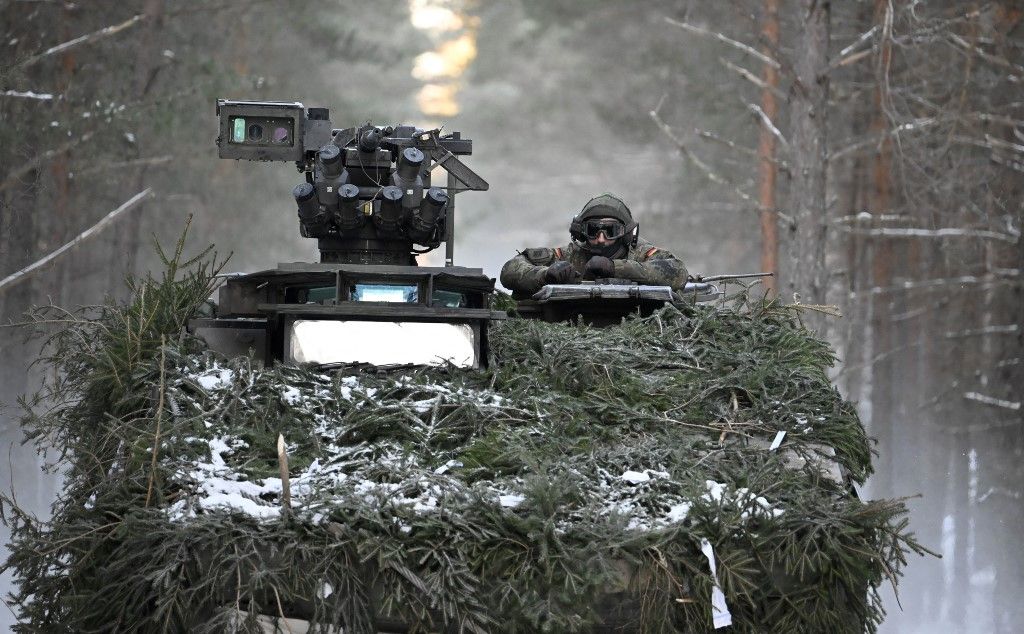 Putin i ukrajinska artiljerija