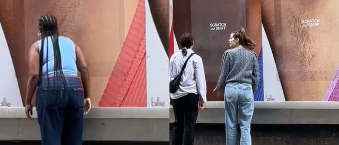 Prolaznici ispred neobičnog plakata
