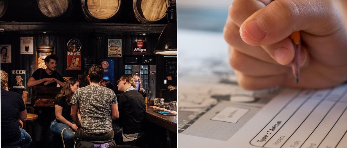 ljudi u pubu okruženi oko stola i slika ruka koja rješava test