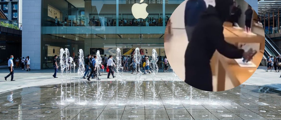 fotografija apple dućana i mala slika pljačkaša koji krade iphone u trgovini