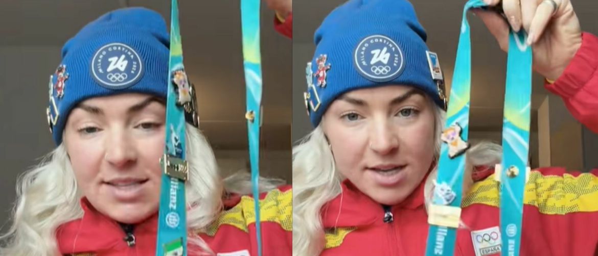 Španjolska klizačica koja pokazuje značke s Olimpijskih igara