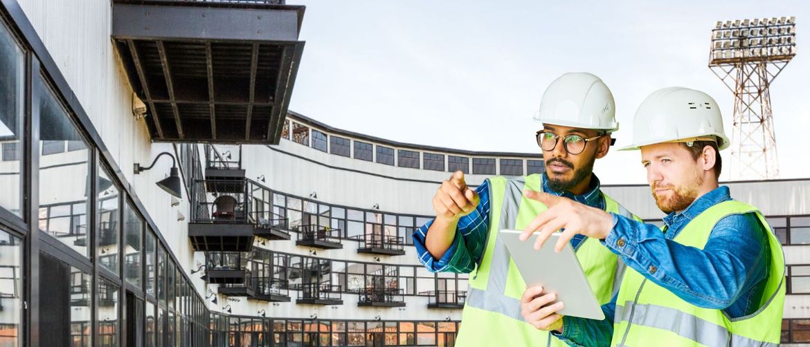 Stanovi u kompleksu Stadium Lofts i građevinski radnici