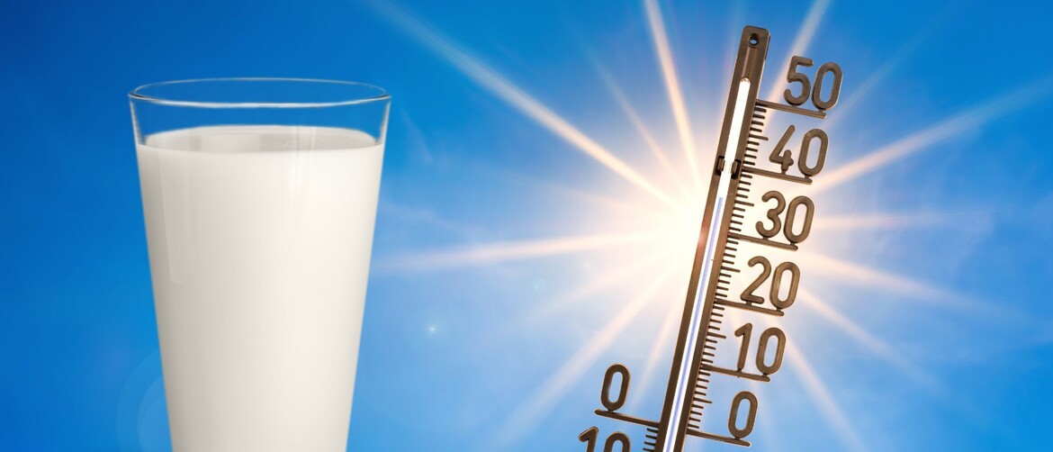 Mlijeko i termometar s visokom temperaturom