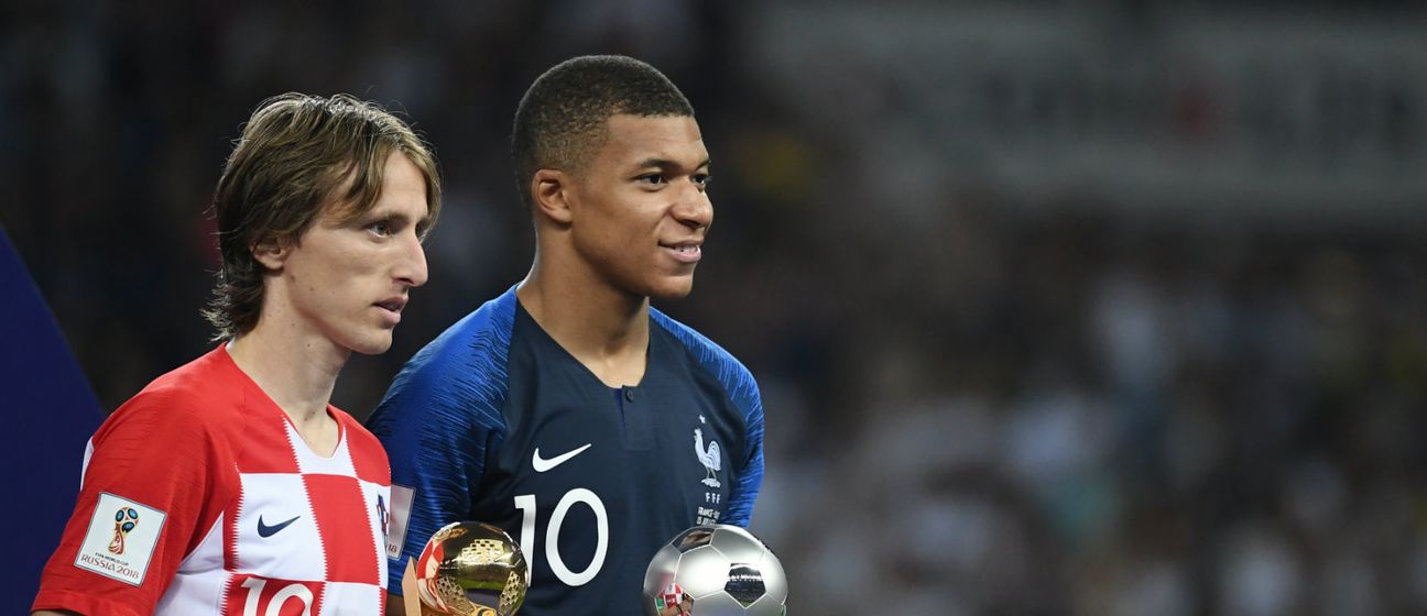 Luka Modrić i Kyliann Mbappe (Foto: AFP)