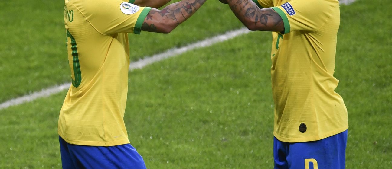 Roberto Firmino i Gabriel Jesus (Foto: AFP)