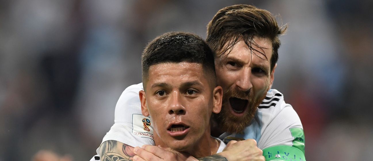Marcos Rojo i Lionel Messi (Foto: AFP)