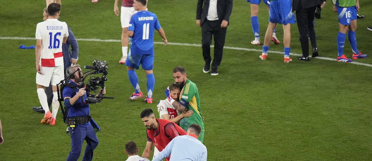 Luka Modrić i Gianluigi Donnarumma