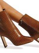 Jimmy Choo, 7364 kune