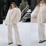 Outfit s inuikii čizmama