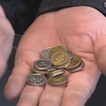 Šaka puna kovanica (Foto: Dnevnik.hr)