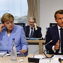 Angela Merkel i Emmanuel Macron (Foto: AFP)