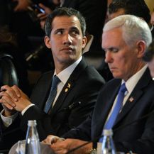 Samoproglašeni venezuelanski predsjednik Juan Guaido i potpredsjednik SAD-a Mike Pence (Foto: AFP)