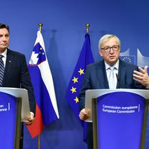 Borut Pahor i Jean-Claude Juncker (Foto: AFP)