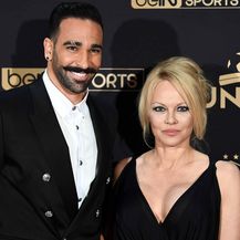 Pamela Anderson i Adil Rami (Foto: AFP)