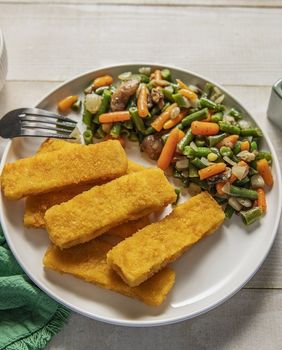 Začinjena mješavina povrća Ledo 4 godišnja doba i riblji štapići od 100% fileta