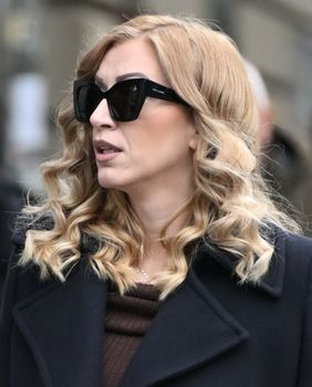 Ulična moda Zagreb lakirane čizme do koljena 2026. - 1