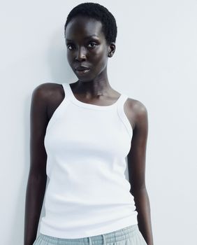 Bijeli top (H&M), 7,99 eura