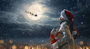 Dijete promatra Djeda Božićnjaka na nebu, ilustracija