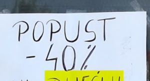Oglas u izlogu s pogreškom u pisanju