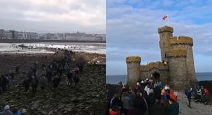 Dvorac The Tower of Refuge i put do njega preko mora pri niskoj plimi
