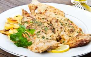 Oslić ispecite u pećnici s nešto limuna, vrhnja i začina