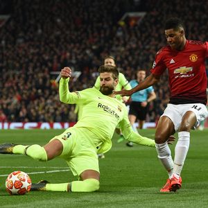 Gerard Pique i Marcus Rashford (Foto: AFP)