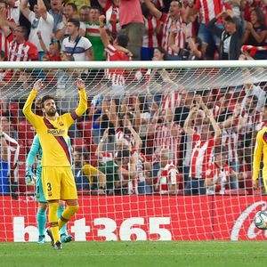 Razočarani igrači Barcelone (Foto: AFP)