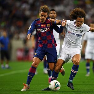 Antoine Griezmann i David Luiz (Foto: AFP)