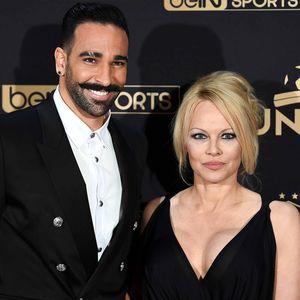 Pamela Anderson i Adil Rami (Foto: AFP)