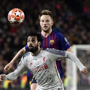 Ivan Rakitić i Mo Salah (Foto: AFP)