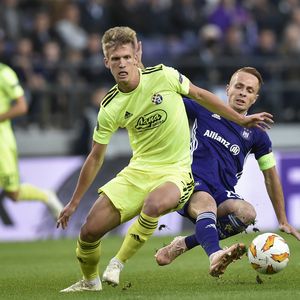 Dani Olmo i Adrien Trebel (Foto: AFP)