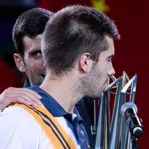 Borna Ćorić i Novak Đoković (Foto: AFP)
