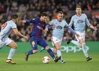 Leo Messi protiv Celte (Foto: AFP)