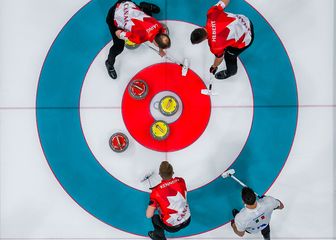 Curling na ZOI-ju (Foto: AFP)