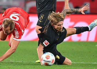 Kristijan Jakić i Harry Kane u duelu