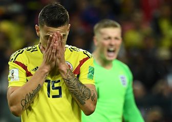 Mateus Uribe i engleski golman Jordan Pickford (Foto: AFP)