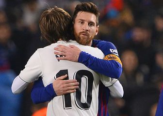 Luka Modrić i Leo Messi (Foto: AFP)